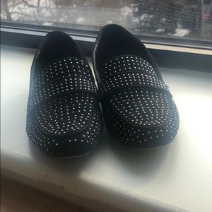 Also black loafers with metallic studs